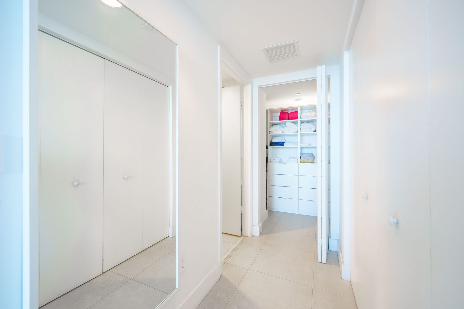 Master bedroom hallway leading to closet