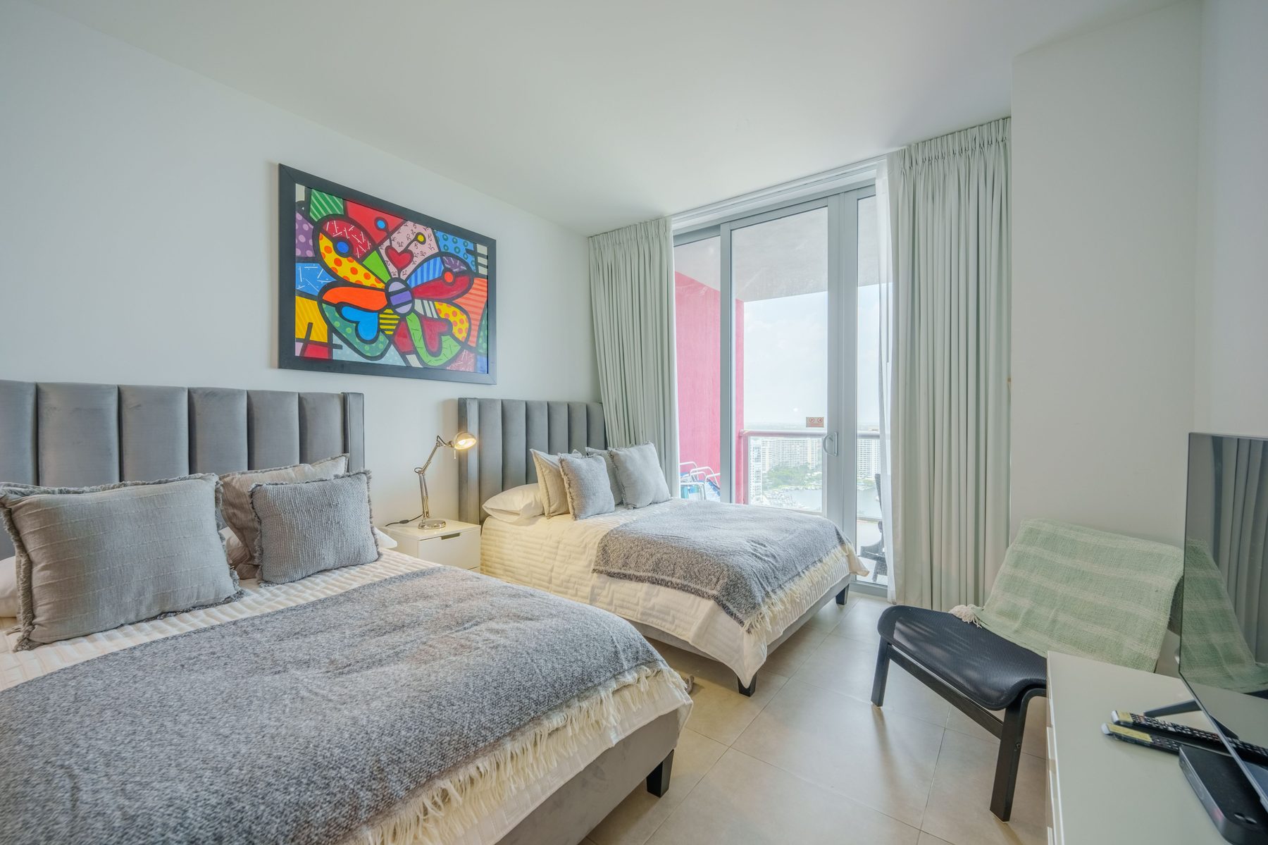Second bedroom, two full beds with balcony