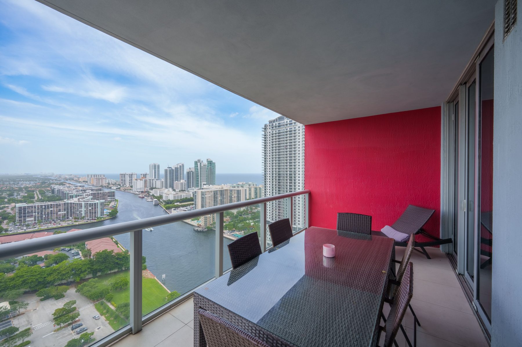 Balcony dining table with ocean skyline view